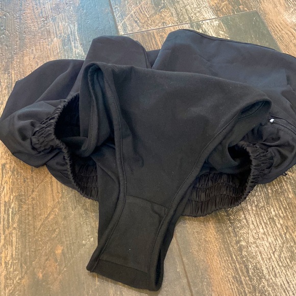 Black 2 inch inseam running shorts size medium. - Picture 2 of 3